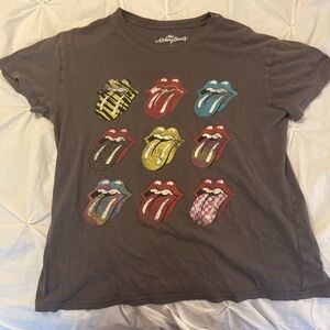 gray rolling stones shirt with colorful rolling stones logos